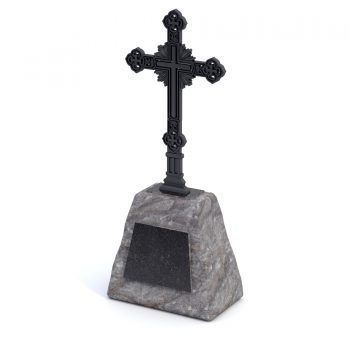 Камень обработанный с металлическим крестом